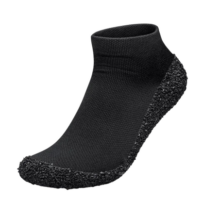 Water-friendly barefoot minimalist shoes drying in the sun, perfect for beach or pool.