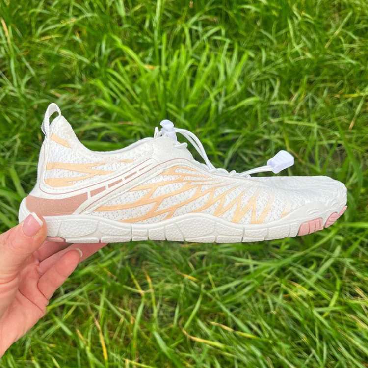 Top-down view of unisex minimalist shoes, emphasizing the wide toe box and simple, functional design
