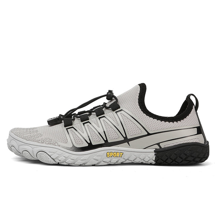 Barefoot running shoes in grey, unisex design, promotes natural foot movement.
