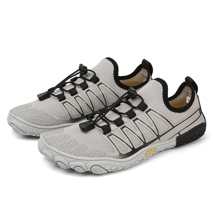 Athletic minimalist shoes, black, breathable upper, perfect for barefoot runners.