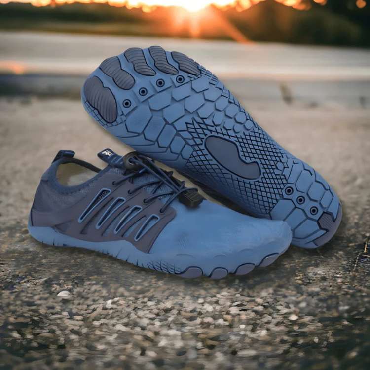 Unisex athletic barefoot shoes, blue, shown in action on a trail, emphasizing flexibility
