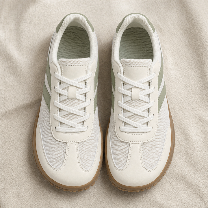 Black unisex barefoot walking shoes with wide toe box, offering natural movement & superior grip.