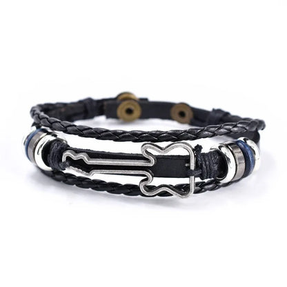 Rustic leather bracelet featuring a detailed bass guitar design, a cool unisex music accessory.