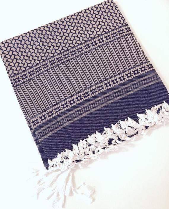 Stylish unisex black and white keffiyeh shemagh neck scarf, ideal for fashion and utility