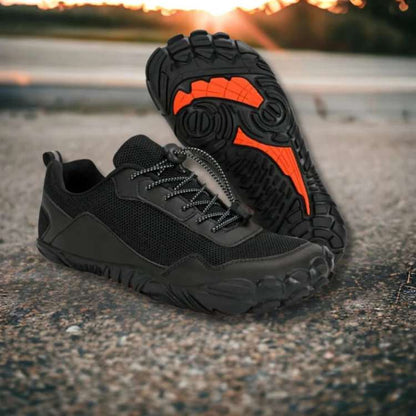 Close-up of the flexible sole on unisex barefoot outdoor shoes, emphasizing natural movement.