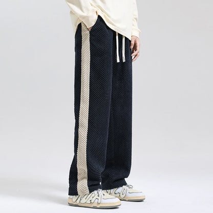 Stylish grey unisex corduroy pants, comfortable for casual everyday wear.