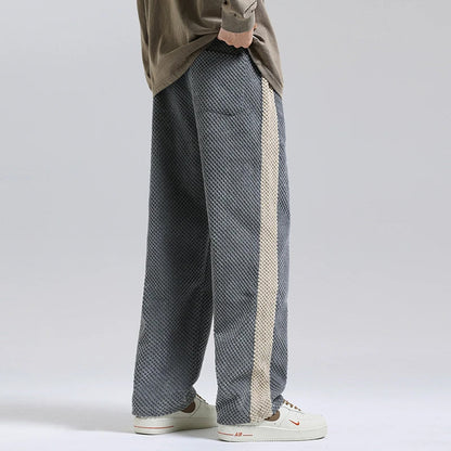 Relaxed fit black corduroy pants, soft and comfortable for unisex everyday style.