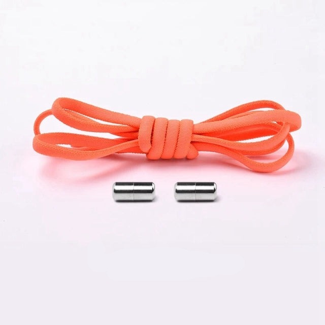 Close-up of white elastic no-tie shoelaces, highlighting texture and design