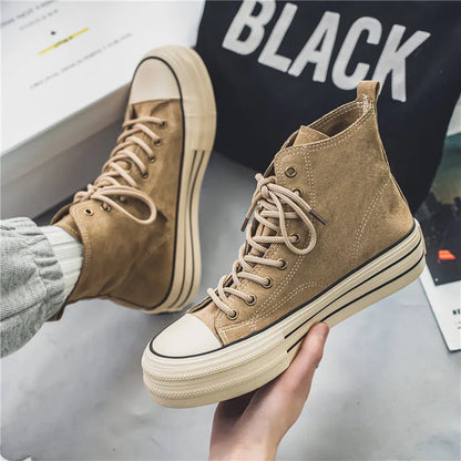 Black platform high top sneakers. Elevate your casual footwear game with this unisex design.