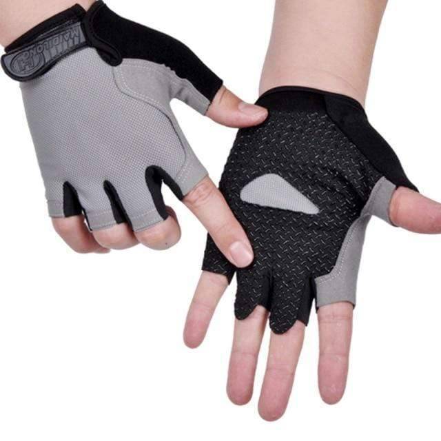Unisex fingerless cycling gloves shown in action on bike handlebars, secure fit