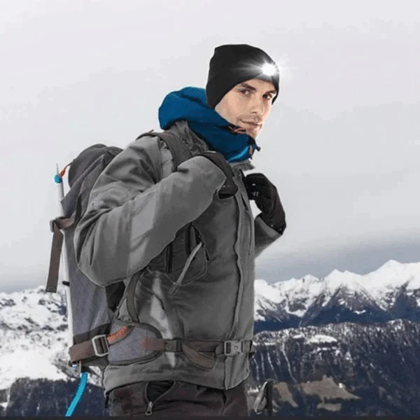 Rechargeable lighted beanie hat against a snowy backdrop, perfect for winter sports and activities.