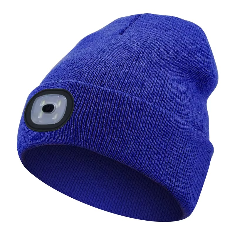 Close-up of the LED light array on a gray beanie, showing powerful illumination for outdoor use.