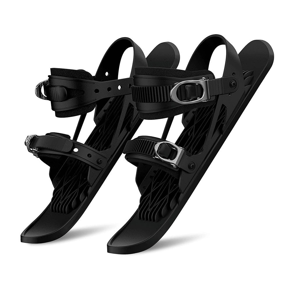 Group of friends with portable mini ski snow skates, ready for winter outdoor adventure