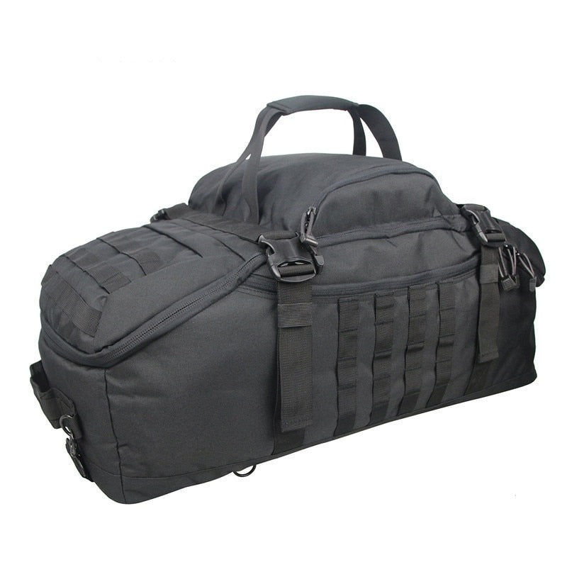 Waterproof tactical duffel backpack resting on rough terrain, emphasizing its outdoor durability.