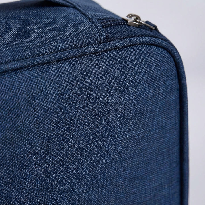 Multi-compartment travel gadget organizer bag for electronics, power banks, & accessories.