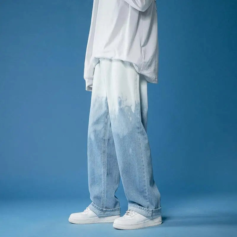 Close-up of the distinctive bleach-dye and fade pattern on unisex wide-leg jeans, showcasing bold texture.