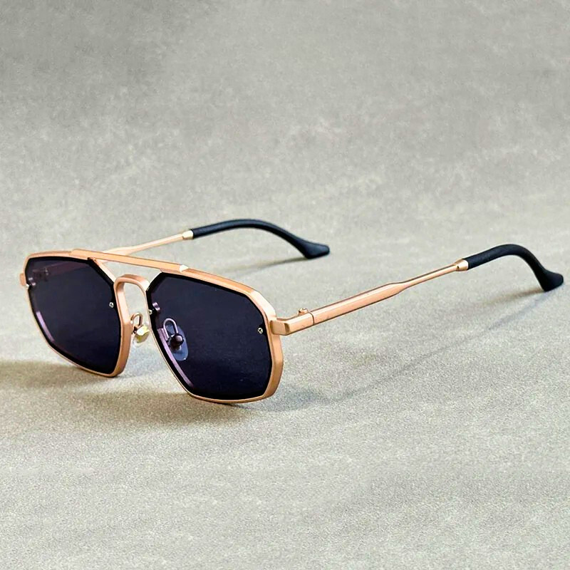 Angular double-bridge sunglasses for unisex wear. Bold style, lightweight alloy frame, essential UV400 eye protection.