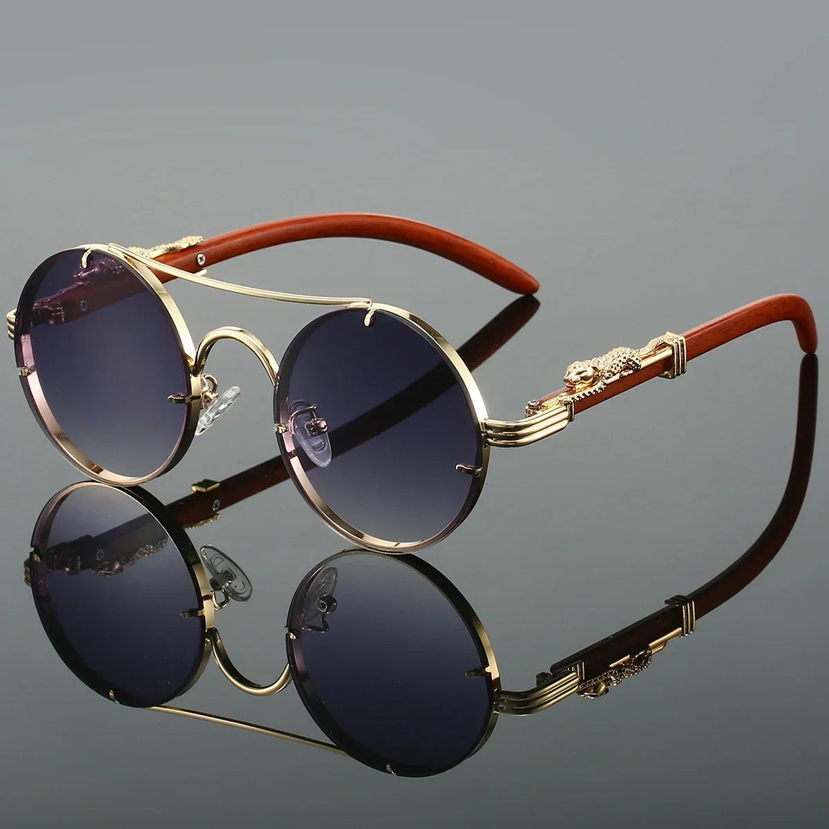 Striking unisex fashion eyewear. Bold design with golden lenses for UV protection & accessory style.