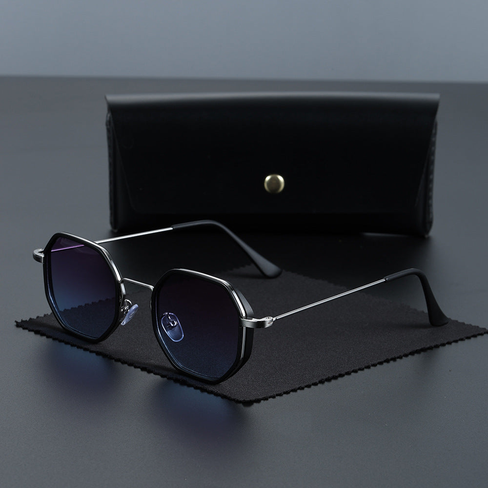 Fashionable hexagonal sunglasses. Bold design, UV400 protection, essential modern accessory.