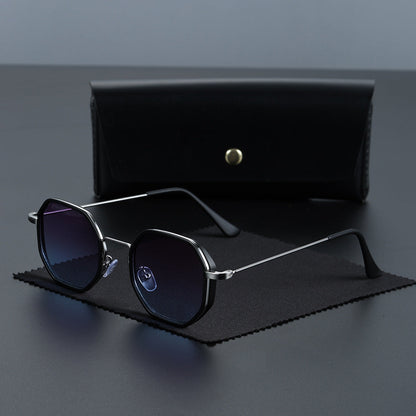 Fashionable hexagonal sunglasses. Bold design, UV400 protection, essential modern accessory.