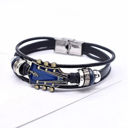 Dark braided genuine leather bracelet featuring a detailed guitar pendant, ideal accessory for musicians & fans.
