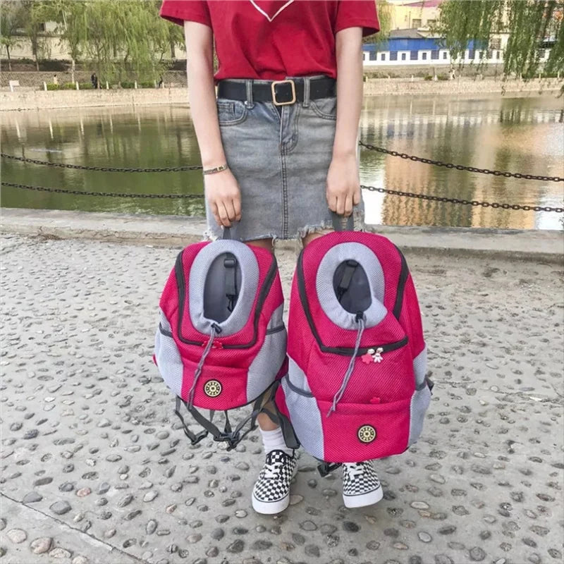 Breathable pet carrier backpack for dogs & cats. Ensures comfort & airflow during travel. Hands-free design.