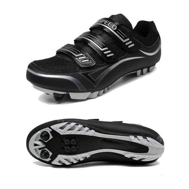Close-up of the sole of unisex cycling shoes with mountain biking cleat visible