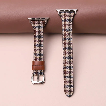 Elegant houndstooth pattern smartwatch band. Adjustable strap for comfortable, secure fit. Unisex accessory.