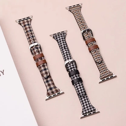 Fashionable houndstooth smartwatch band. Unisex accessory in black & brown, offering an elegant & secure fit.