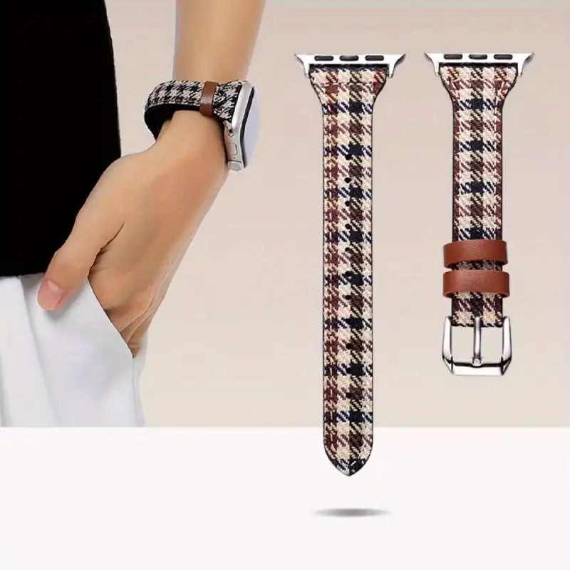 Detailed view of elegant houndstooth smartwatch band. Classic brown & black pattern, adjustable for unisex appeal.