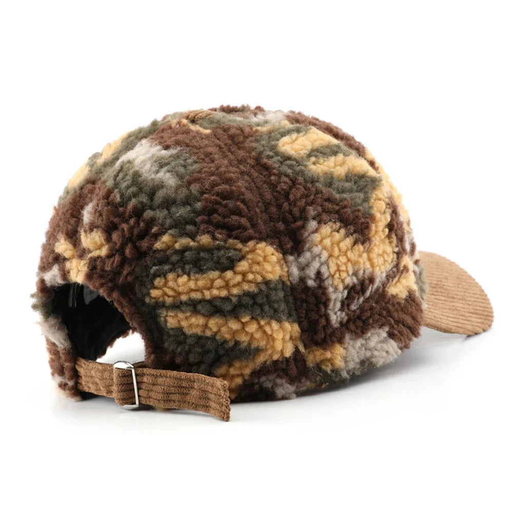 Close-up of the intricate camouflage pattern on a plush fleece winter hat.