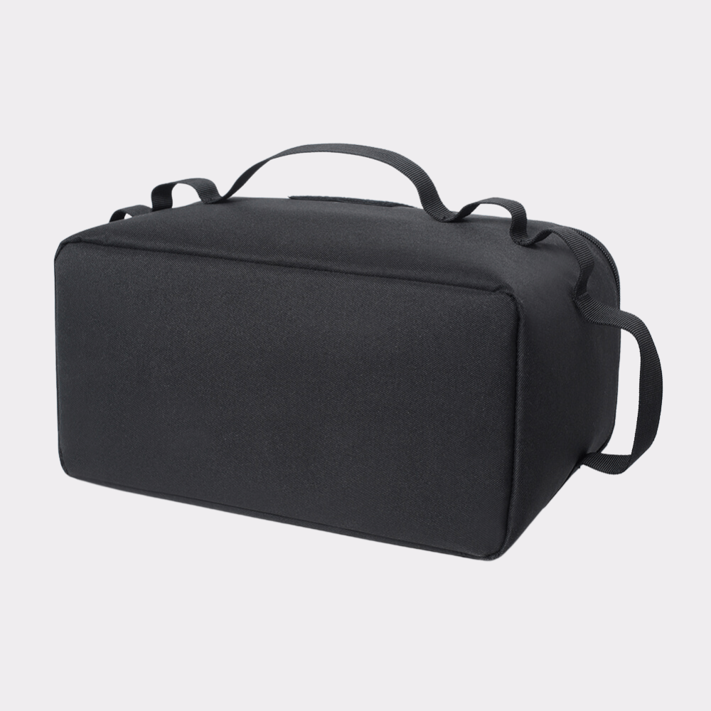 Durable camping gear storage bag with ergonomic handles, perfect for portable outdoor cooking.