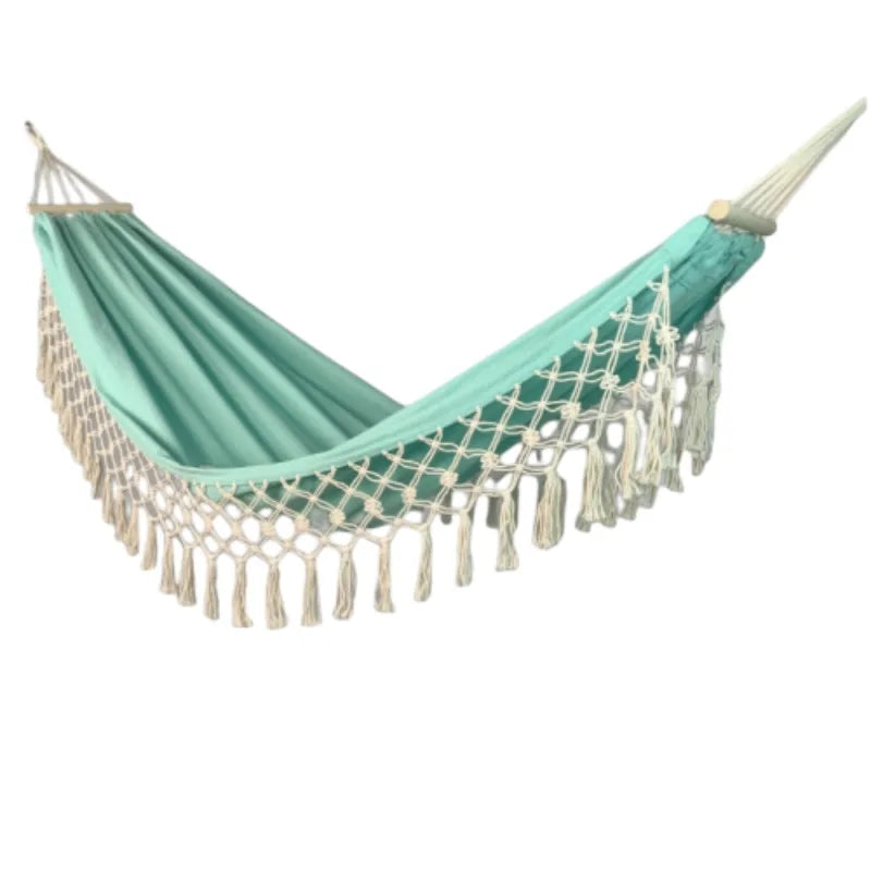 Outdoor unisex canvas hammock with strong wooden posts, providing a comfortable anti-rollover experience