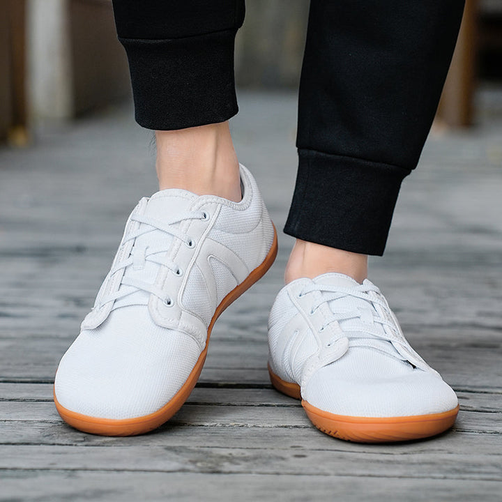 Barefoot footwear with a flexible sole for natural comfort & movement.