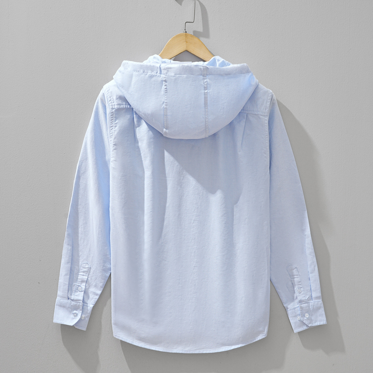 Relaxed fit unisex Chelsea lightweight hoodie shirt, zip front, comfortable long sleeve for casual style.