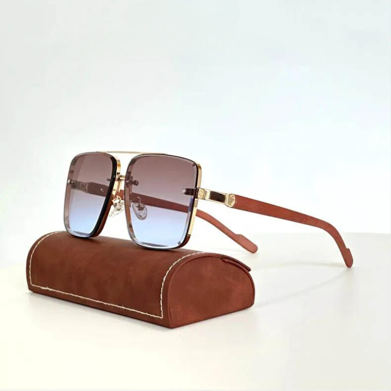 Close-up of chic unisex gold-frame sunglasses, highlighting elegant metal frame and UV400 protective lenses.