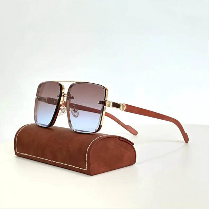 Close-up of chic unisex gold-frame sunglasses, highlighting elegant metal frame and UV400 protective lenses.