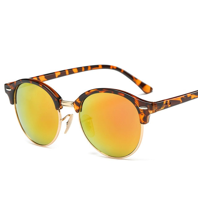 Trendy unisex eyewear with UV400 anti-glare lenses. Durable alloy frame sunglasses, a perfect summer fashion accessory.