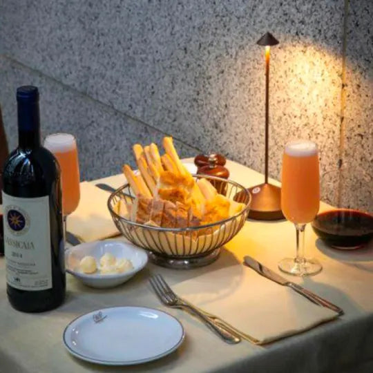 Water-resistant ClarityGlow LED lamp, portable & dimmable, great for outdoor ambiance.