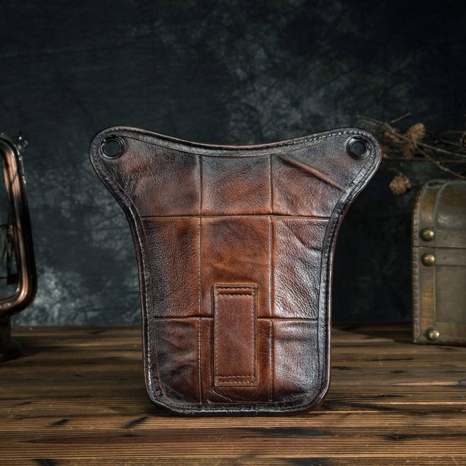 Front view of classic unisex leather sling bag, rich brown genuine cowhide shoulder pack