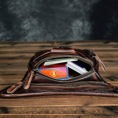 Unisex leather sling bag with adjustable strap, comfortable brown cowhide shoulder pack