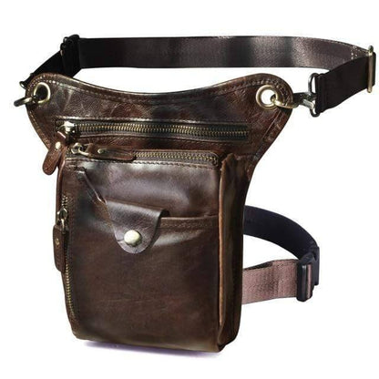 Model wearing classic brown genuine leather sling bag, ideal for outdoor adventures