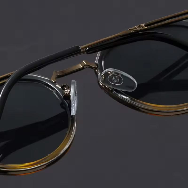 Classic metal frame unisex eyewear for fashion and essential UV protection.