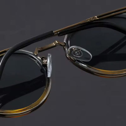 Classic metal frame unisex eyewear for fashion and essential UV protection.