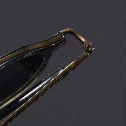 Durable metal frame unisex sunglasses, offering classic style and UV protection.