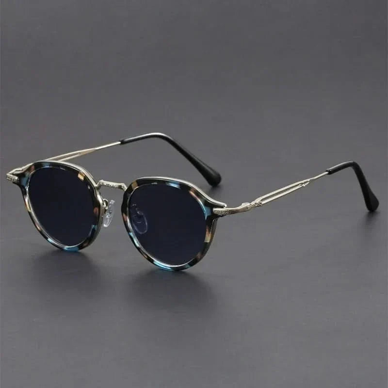 Fashionable unisex metal frame sunglasses for all-day UV protection & comfort.