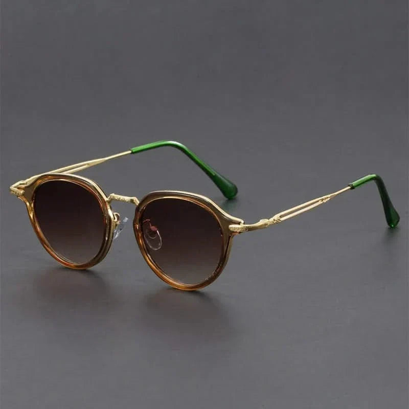 Anti-glare unisex shades with classic metal frames, designed for UV protection.