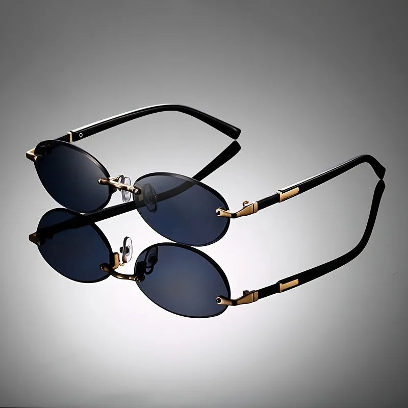 Fashionable oval rimless sunglasses for men & women. Lightweight design with UV400 lenses.