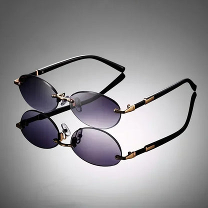 Classic oval rimless sunglasses. Lightweight, comfortable & offers full UV400 protection. Unisex fashion.