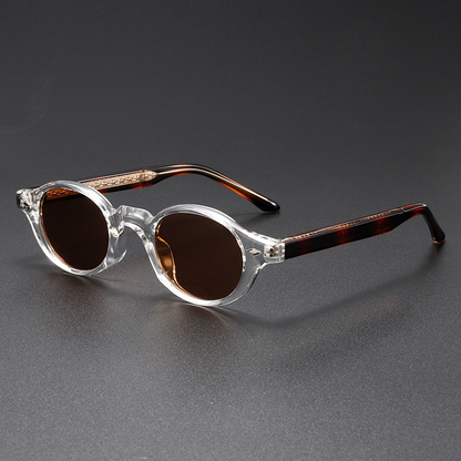Stylish unisex retro sunglasses with UV400 protection. Classic oval design & dark tint, perfect fashion accessory.